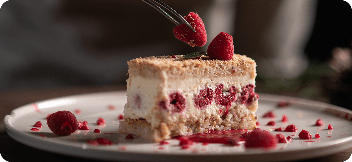 Creamy raspberry cake with fork