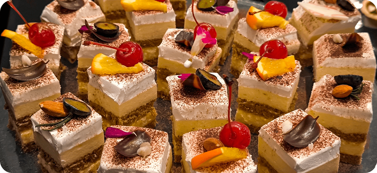 Assorted cakes with cherries and almonds