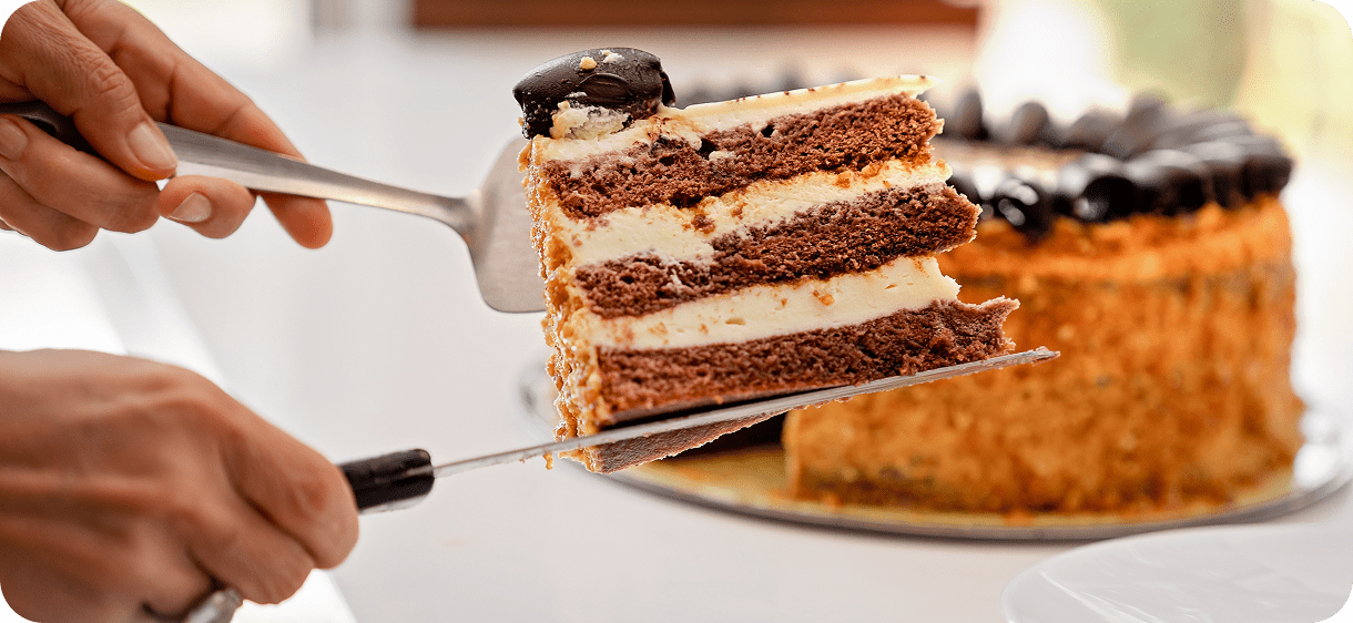 Chocolate cake slice being served