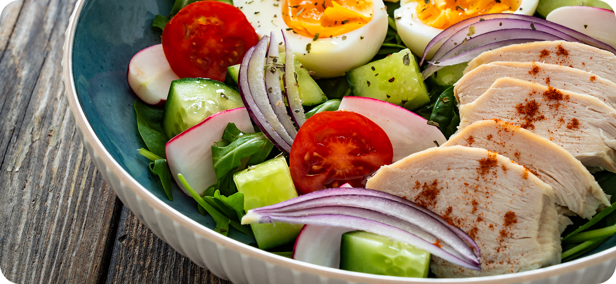 Chicken salad with vegetables and eggs