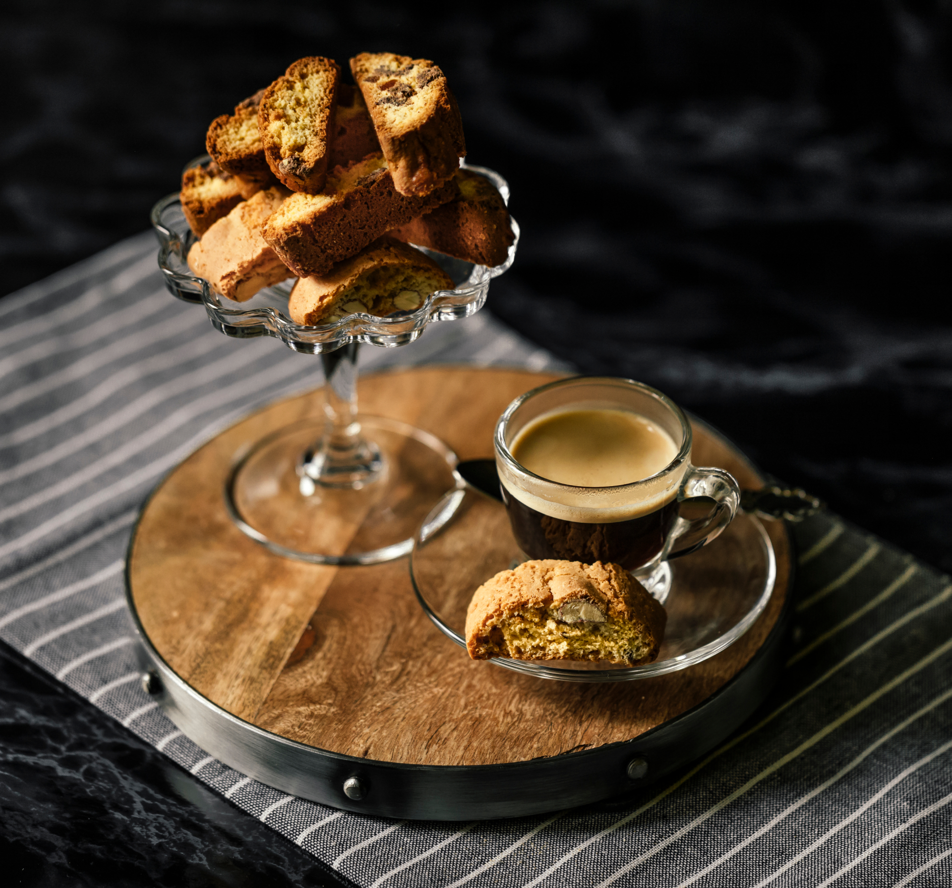 Biscotti and espresso on wooden tray